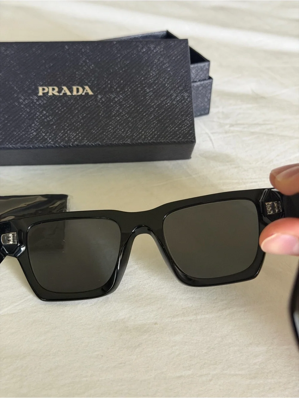 Prada signature logos